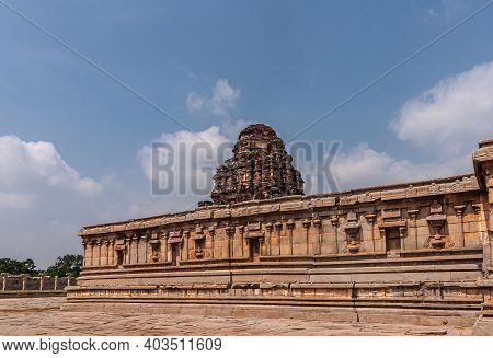 Hampi, Karnataka, India - November 5, 2013: Vijaya Vitthala Temple. West Ruinous Gopuram Peeps Over 