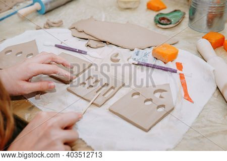 Womens Hands Knead Clay, Drawing Elements Of The Product. Production Of Ceramic Products At The Mast
