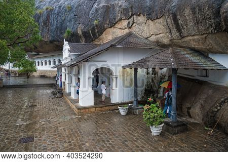 Dambulla, Sri Lanka - March 14, 2015: Rainy Day At The Ancient Cave Buddhist Temple Of Rangiri Dambu