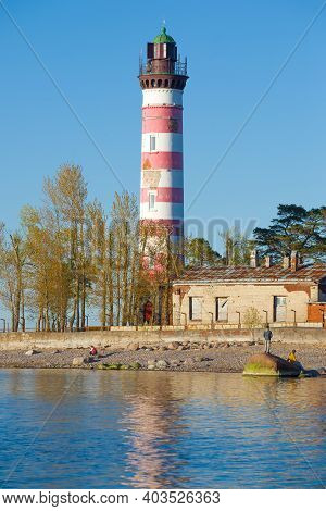 Old Shepelevsky Lighthouse On The Karavaldai Peninsula Close Up On A Sunny May Day. Leningrad Region