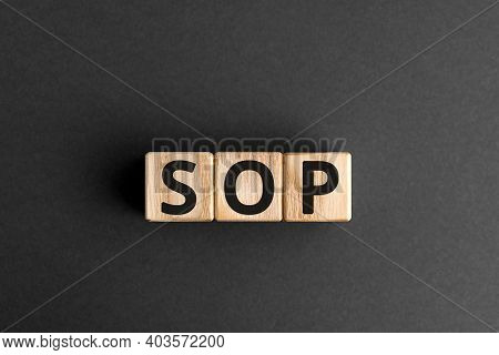 Sop - Acronym From Wooden Blocks With Letters, Abbreviation Sop Standard Operating Procedure Concept