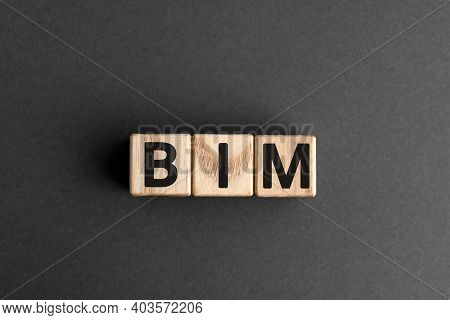 Bim - Acronym From Wooden Blocks With Letters, Abbreviation Bim Building Information Modeling Concep