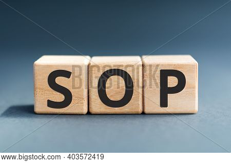 Sop - Acronym From Wooden Blocks With Letters, Abbreviation Sop Standard Operating Procedure Concept