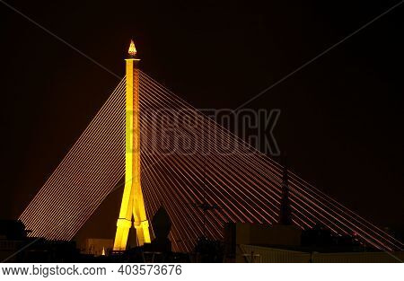 Night View Of The Rama Viii Bridge, A Cable-stayed Bridge Crossing Chao Phraya River Which Named Aft