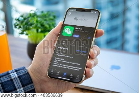 Alanya, Turkey - December 18, 2020: Man Hands Holding With Iphone 12 Pro Max Gold With Messenger Wec