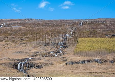 Waterfall Range In The Hills Of Fljotsdalur Valley In East Iceland
