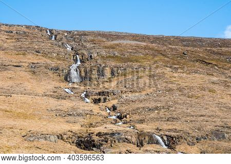 Waterfall Range In The Hills Of Fljotsdalur Valley In East Iceland