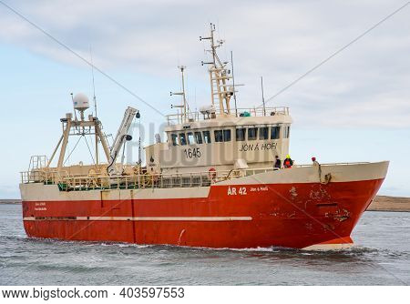Hofn I Hornafirdi Iceland - April 23. 2020: Trawler Jon A Hofi Entering Port Of Hornafjordur