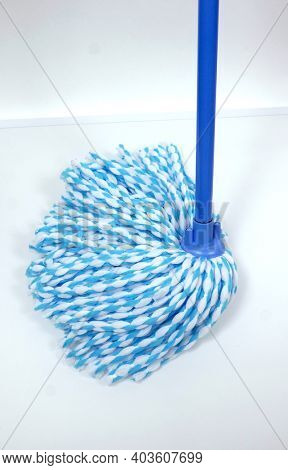 Rope mop in blue. Microfiber mop. House cleaning.