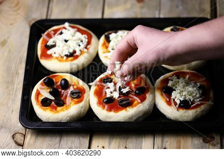 Mini Pizza Cooking. Home-made Fast Food. Soft Focus.
