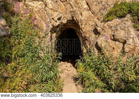 Entrance To Small Cave Below Windsor Lake In Coloardo Mountains