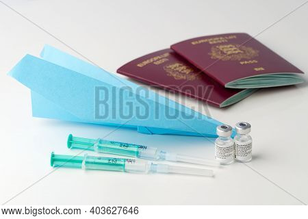 Estonia, Tallinn - 15.01.2021: Travelling With Passport, A Certificate Of Immunity Vaccination Again