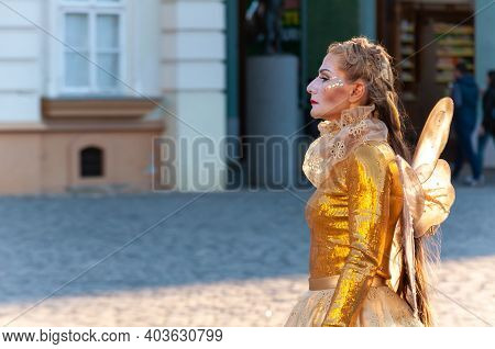 Timisoara, Romania - March 31, 2017: Woman In A Masquerade Costume, Posing As A Living Statue At The