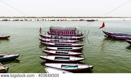 Varanasi, India - May 06, 2019 - A View Of Historic Varanasi Ghats, Ancient Temples And Buildings Al