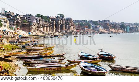 Varanasi, India - May 06, 2019 - A View Of Historic Varanasi Ghats, Ancient Temples And Buildings Al