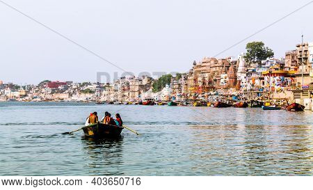 Varanasi, India - May 06, 2019 - A View Of Historic Varanasi Ghats, Ancient Temples And Buildings Al