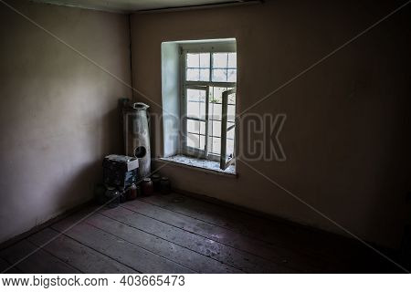 Interior Of An Old Abandoned Building. Interior Of A Vintage Ruined Dirty Room. Daytime