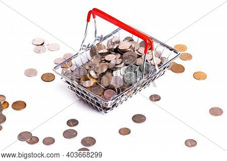 Metal Basket With Metal Money Coins On White Background - Multicurrency Basket Concept