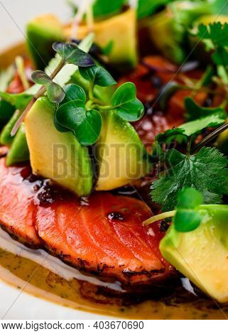 Top View Of Seared Salmon With Avocado In Bowl, Seared Salmon Salad With Sauce At A Premium Restaura