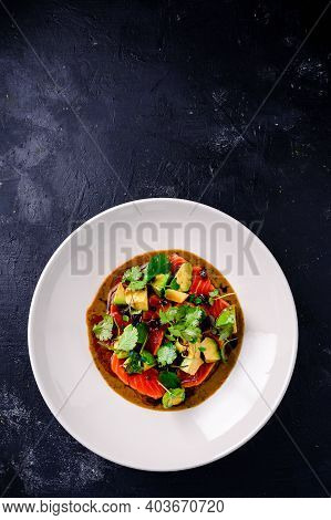 Top View Of Seared Salmon With Avocado In Bowl, Seared Salmon Salad With Sauce At A Premium Restaura