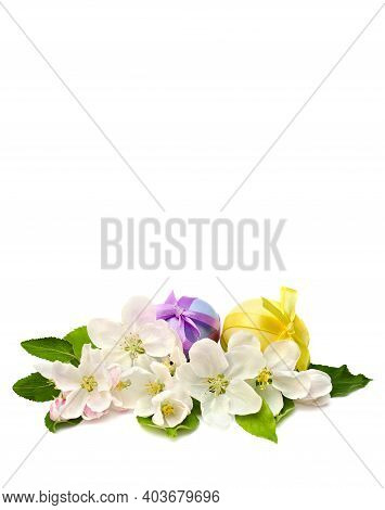 Apple Blossom And Easter Eggs On A White Background With Space For Text