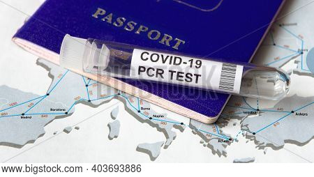 Covid-19, Travel And Test Concept, Tube For Coronavirus Pcr Testing And Tourist Passport On Europe M