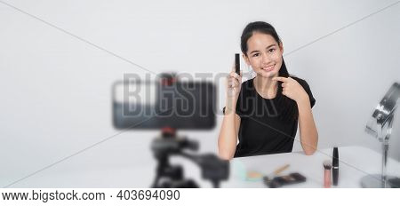Beauty Blogger. Asian Teen Woman Sit In Front Of Camera And Live Broadcasting