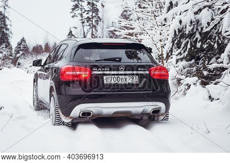 Moscow, Russia-january 10, 2021: A Black Mercedes Benz Gla 250 Luxury Crossover Makes Its Way Throug