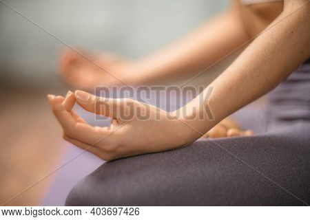 Young Woman Meditating In The Lotus Pose At Home. Practicing Yoga Indoors. Harmony, Yoga Practice, B