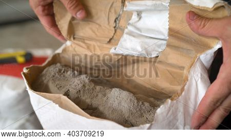 Dry Mortar For Laying The Floor In A Bag. Cement Or Grout In A Construction Bag. Cement Powder In Ba