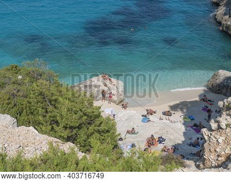 Gulf Of Orosei, Sardinia, Italy, September 8, 2020: A View Of Cala Goloritze Beach With Bathing Tour