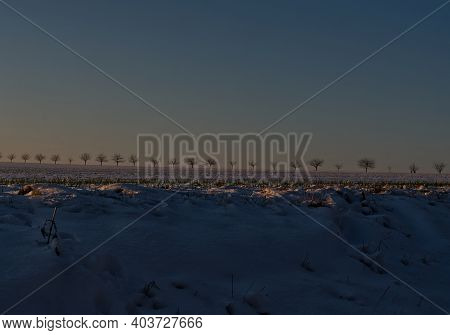 Sunset In Thuringia With Snow At Krippendorf In Winter