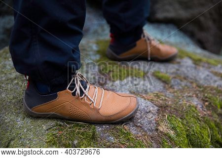 Detail Of Barefoot Shoes On The Rock.