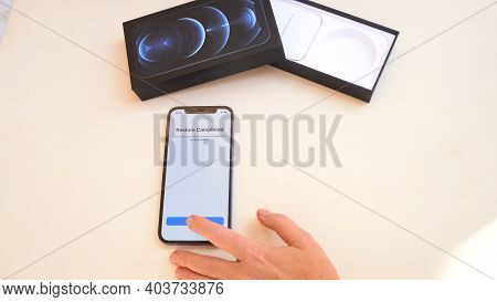 Puerto Cruz, Spain - January 05, 2020: Iphone 12 Pro, Desplay With Restore Completed Screen