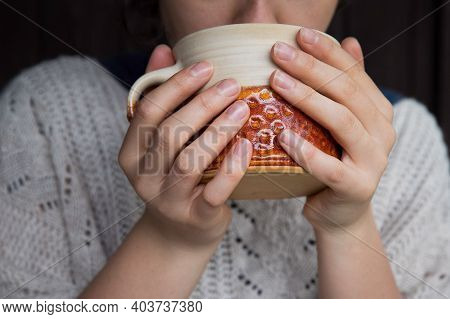 Young Woman Holding Mug Of Tea. Autumn Or Winter Moody Weekend. Lazy Day, Quarantine, Stay Home, Cos