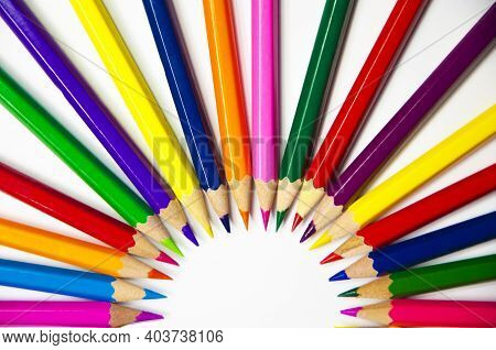 Semi-sircle Of Colored Pencils On White Background