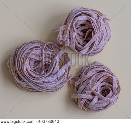 Raw Whole Grain Brown Pasta. Delicate Wholemeal Pasta Made Of Graham Flour, Rich In Nutrients: Prote