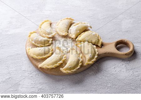 Homemade Raw Frozen Vegan Dumplings, Vareniki, Pierogi, Kreplach  Stuffed With Vegan Lentil 