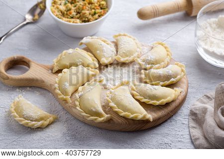 Homemade Raw Frozen Vegan Dumplings, Vareniki, Pierogi, Kreplach  Stuffed With Vegan Lentil 