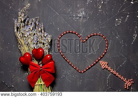 Valentines Day Congratulation. Red Rose And Greeting Card With Heart Sign On Black Background Top Vi