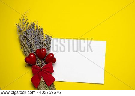 Valentines Day Congratulation. Red Rose And Greeting Card With Heart Sign On Yellow Background Top V