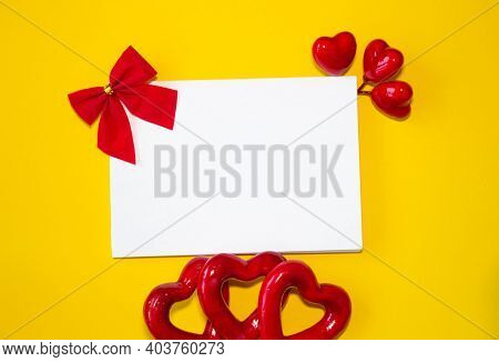 Valentines Day Congratulation. Red Rose And Greeting Card With Heart Sign On Black Background Top Vi