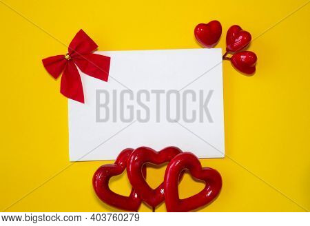 Valentines Day Congratulation. Red Rose And Greeting Card With Heart Sign On Black Background Top Vi