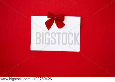 Valentines Day Congratulation. Red Rose And Greeting Card With Heart Sign On Black Background Top Vi