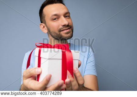 Portrait Shot Of Handsome Happy Brunette Unshaven Young Male Person Isolated Over Blue Background Wa