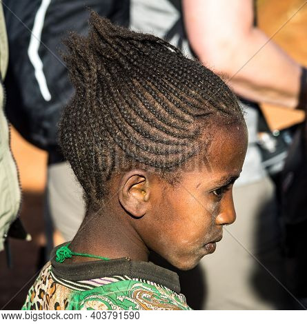 Aksum, Ethiopia - Feb 08, 2020: Ethiopian Girl On The Road From Axum To The Simien Mountains, North 