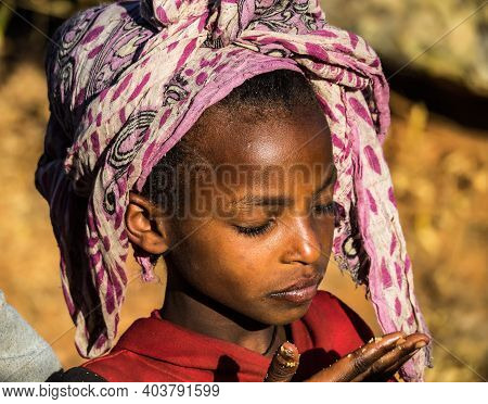 Aksum, Ethiopia - Feb 08, 2020: Ethiopian Girl On The Road From Axum To The Simien Mountains, North 
