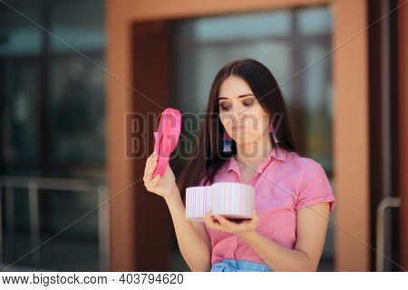 Unhappy Girlfriend Receiving A Bad Gift On Valentine\'s Day