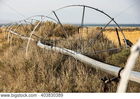 Irrigation System Spreads Across Dry Field In Nevada Valley In Great Basin National Park