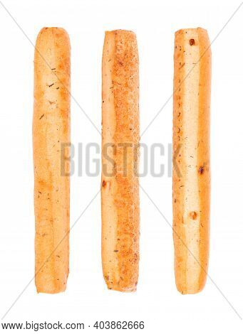 Bread Sticks Isolated On White Background. Grissini, Italian Breadsticks With Onions And Herbs. Top 